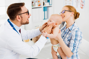 mother and baby on reception at the child pediatrician