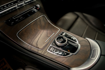 Luxury Car cockpit - Modern car interior - Interior of car detail.
