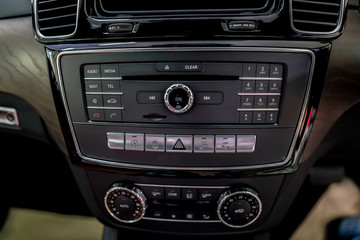 Fototapeta na wymiar Luxury Car cockpit - Modern car interior - Interior of car detail. 