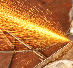Sparks while cutting steel in the factory