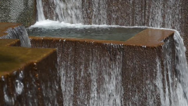 Close up shot of one of the falls and pools at Keller Fountain in Portland, Oregon.