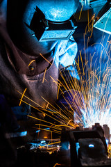 Industrial steel welder in factory