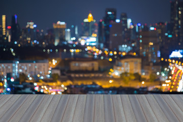 Opening wooden floor, Abstract blurred bokeh lights, central business downtown background