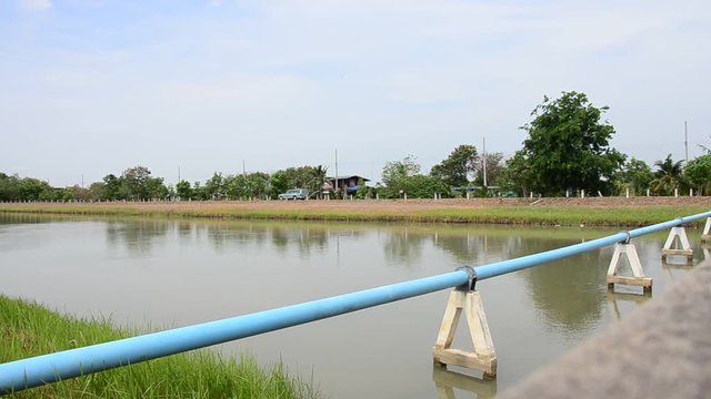 Motion of water in Canal watercourse waterway of water supply with water pipe in countryside Nonthaburi, Thailand