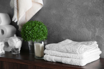 Fototapeta na wymiar Bath accessories on grey wall background