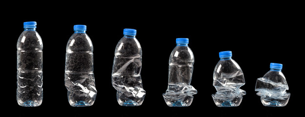 different steps of compressing a plastic bottle isolated on black background