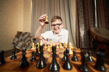 boy playing chess