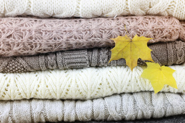 stack of sweaters knitted autumn concept