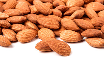 peeled almonds isolated on a white background 
