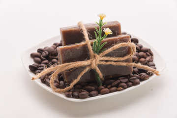Composition with grains of coffee, soap and decorative objects