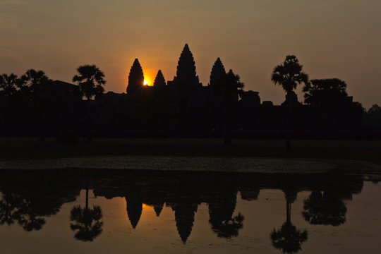 Reflections Of Ankor Wat At Sunrise