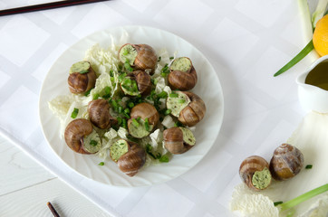 snail white plate white napkin