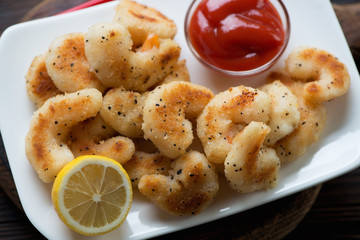 Close-up of king shrimps fried in panko breadcrumbs, studio shot
