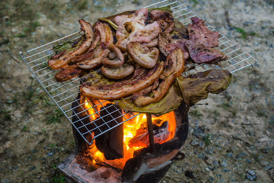 Grilled pork and entrails with banana leaf