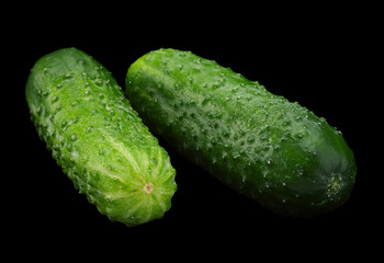 Cucumber vegetable on black