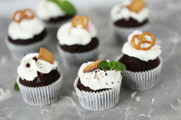 Chocolate cupcakes on a grey background