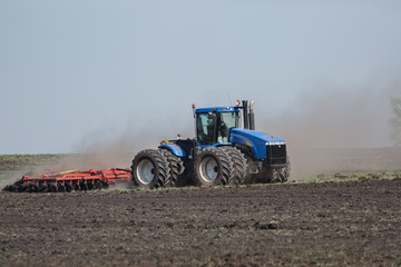 Fototapeta premium Tractor with plow