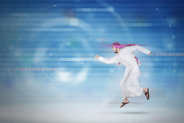 Arabic businessman running inside cyberspace