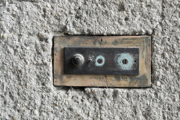 old weathered doorbell