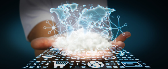 Businessman holding world and cloud