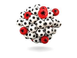 Pile of footballs with flag of albania
