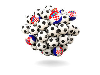 Pile of footballs with flag of croatia