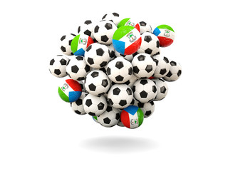 Pile of footballs with flag of equatorial guinea