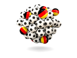 Pile of footballs with flag of germany