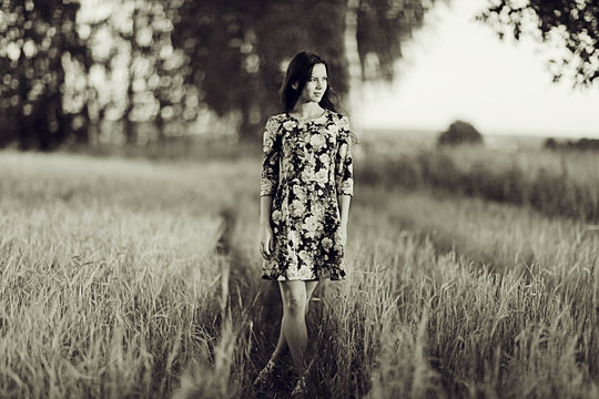 black and white photo of the girl in a field freedom
