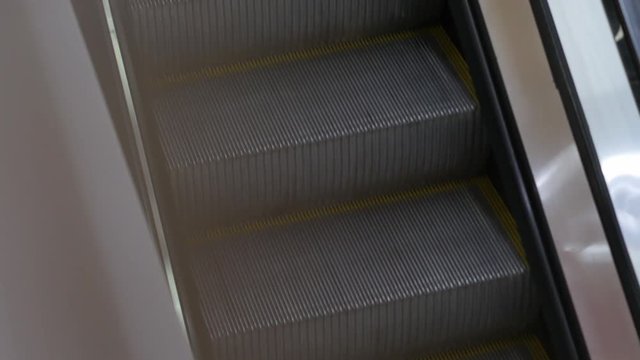Empty escalator steps going down