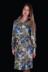 Beautiful girl in Studio on dark background dress