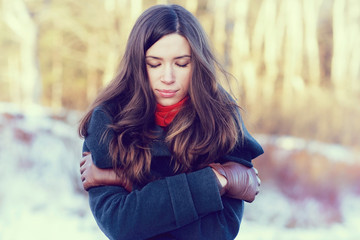 Winter portrait of a woman of stress