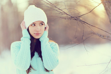 winter portrait of a cute girl in love