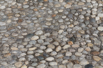 Round stones in the ground