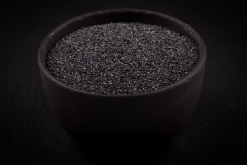 poppy seeds in a stone bowl