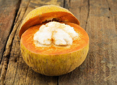 Santol fruit on wood