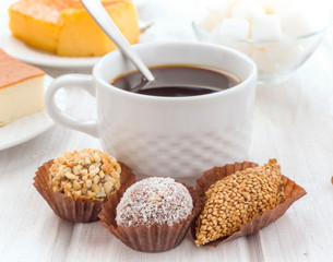cup of coffee with chocolates