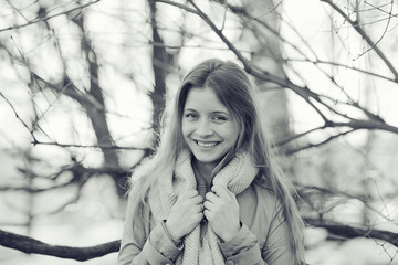 monochrome urban portrait of a woman in a coat