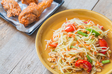 Green Papaya Salad on wood table