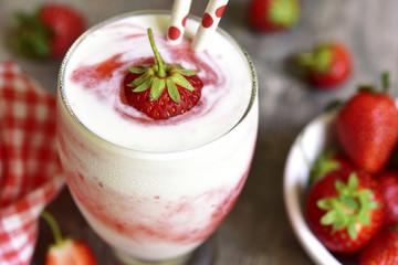 Vanilla milkshake with strawberry.