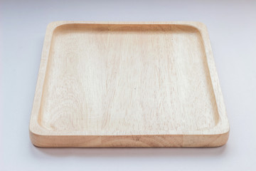Close up empty flat wooden dish