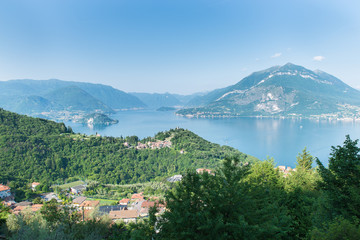 Fototapeta na wymiar Panorama long the road that rises from lake Como (Varenna) in Esino Lario (913 m), Italy, headquarters in 2016 of the 12th International Wikimedia conference