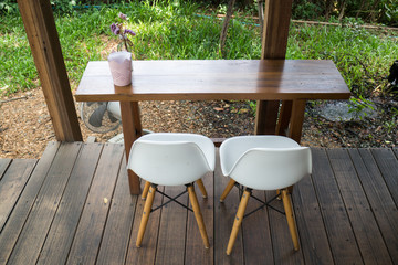 Wooden table and modern chair