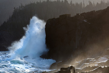 Large waves breaking on rocks