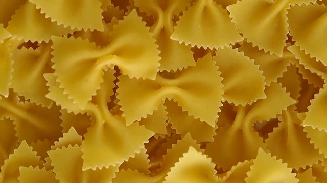 Rotating italian farfalle pasta.