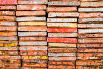 Colored plates by scaffolding on a building site