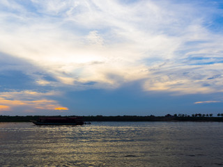 Silhouette of boat  lake during sunset