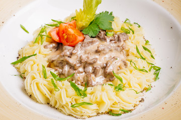 Beef Stroganoff with mashed potatoes.