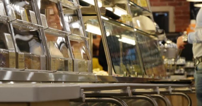 people in the canteen choose what to eat