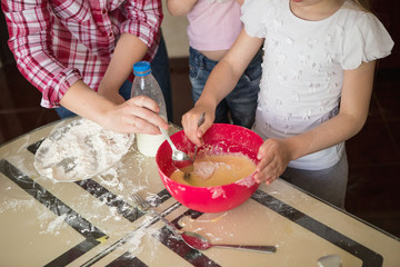 Girl 7 years preparing breakfast in the kitchen. baby girls, Mom, Kitchen